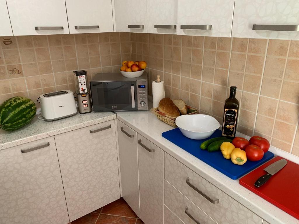 Kuhinja ili čajna kuhinja u objektu Axenia Hotel