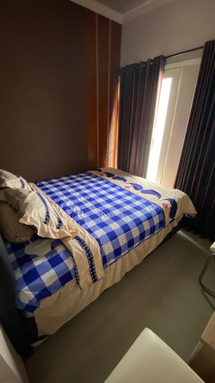 Postel nebo postele na pokoji v ubytování gigafa homestay