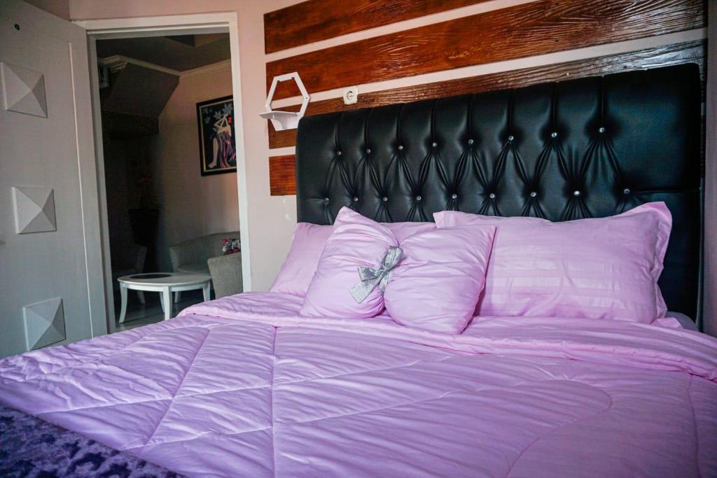 Postel nebo postele na pokoji v ubytování gigafa homestay