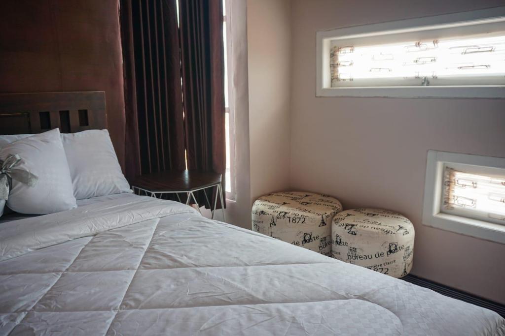Postel nebo postele na pokoji v ubytování gigafa homestay