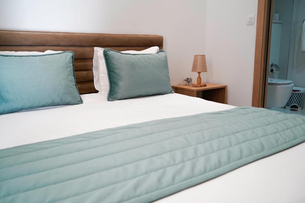 Letto o letti in una camera di Hôtel Suisse Tunis