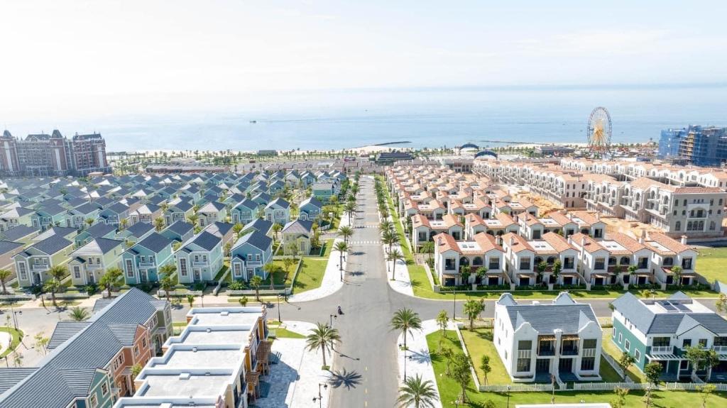 an aerial view of a city with houses and the ocean at Novaworld Beach villa in Phan Thiet