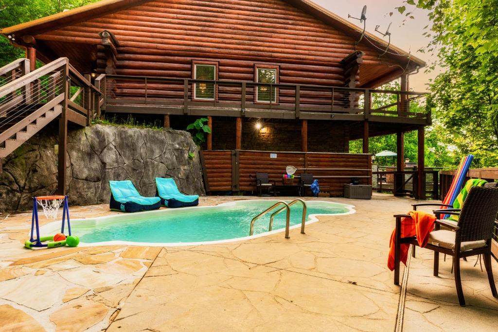 Image showcasing Enclave - 5 Suites - Private Outdoor Pool - Arcade - Fire Table & Pit ...