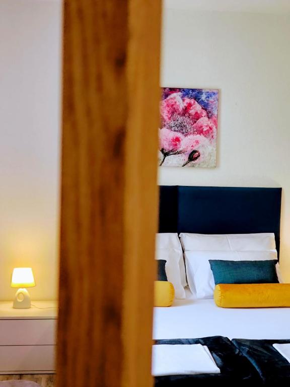 Posteľ alebo postele v izbe v ubytovaní Apartments Lavel