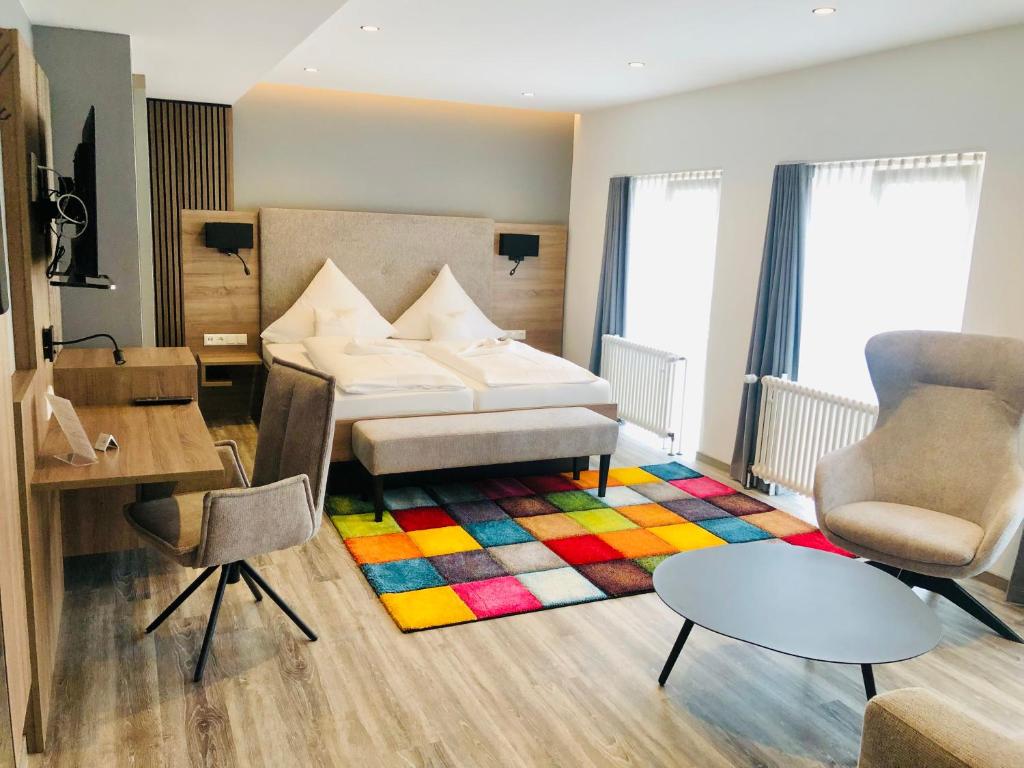 Postel nebo postele na pokoji v ubytování Hotel Garni "Brauerei Keller"