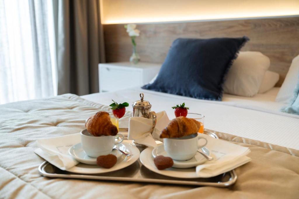 Postel nebo postele na pokoji v ubytování Hotel Hannover