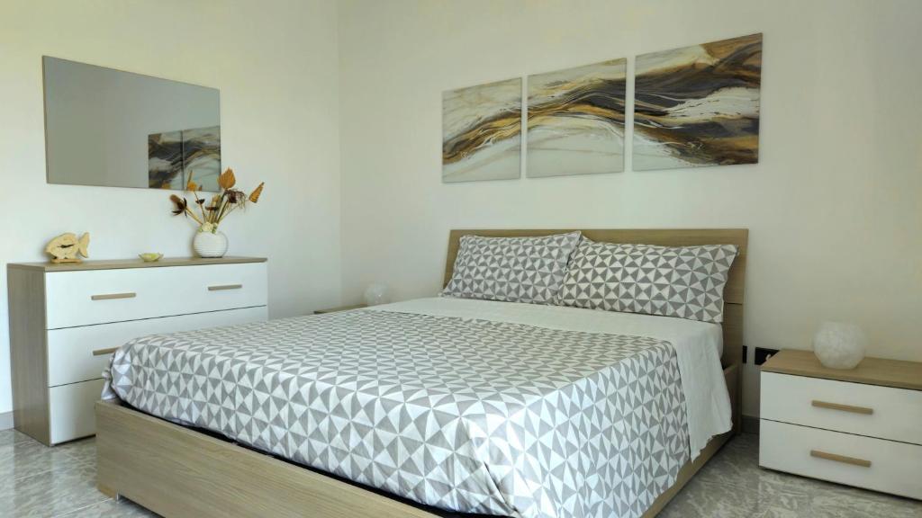 Postel nebo postele na pokoji v ubytování Apulian Apartment