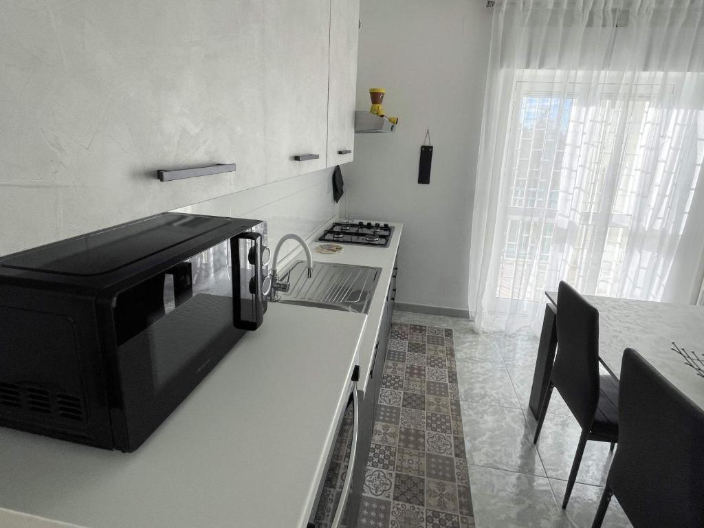 Kuchyň nebo kuchyňský kout v ubytování Apulian Apartment