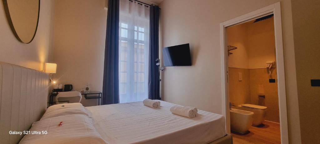 Postel nebo postele na pokoji v ubytování EVA LUXURY SUITE