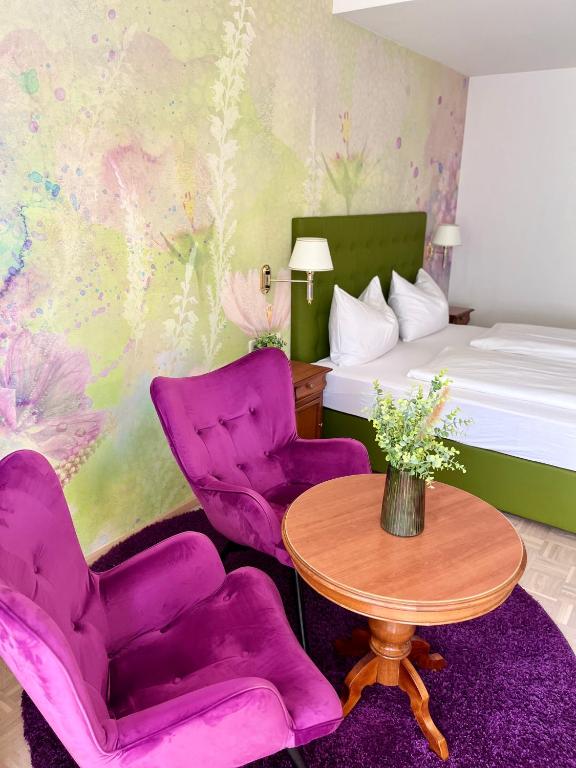 Postel nebo postele na pokoji v ubytování Hotel Allmer