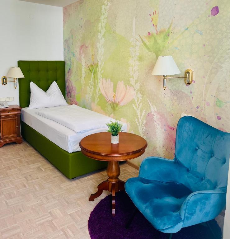 Postel nebo postele na pokoji v ubytování Hotel Allmer