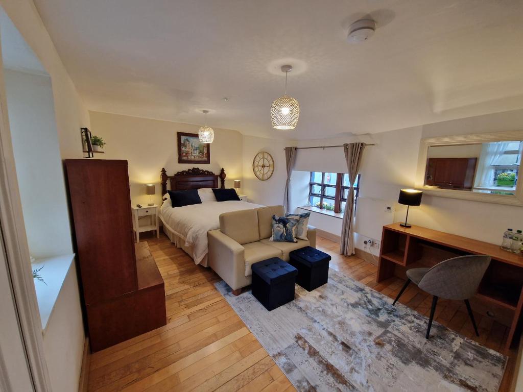 Postel nebo postele na pokoji v ubytování The Nu Place Suite