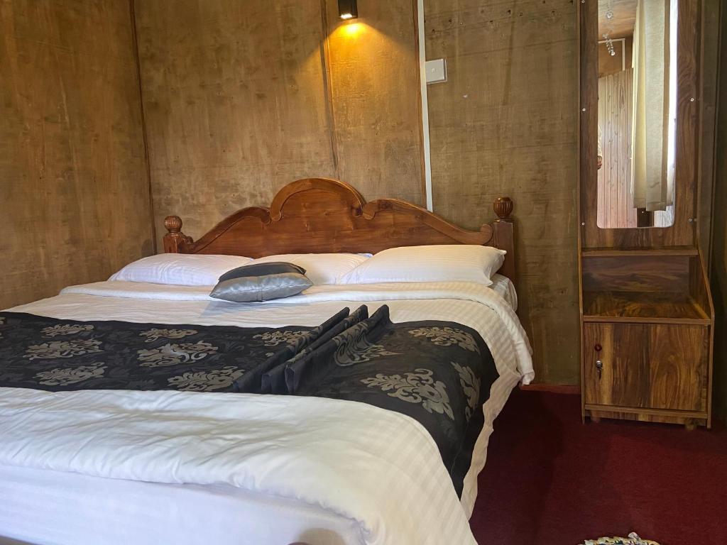 Postel nebo postele na pokoji v ubytování New Happy inn