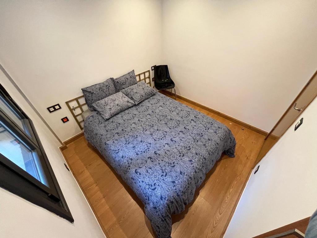 Postel nebo postele na pokoji v ubytování Lotila Flats Cabañaquinta