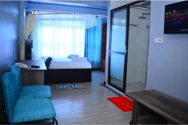 Postel nebo postele na pokoji v ubytování BRIMAK HOTEL