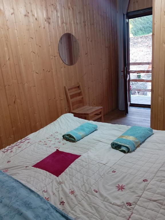Postel nebo postele na pokoji v ubytování Stone House marexi