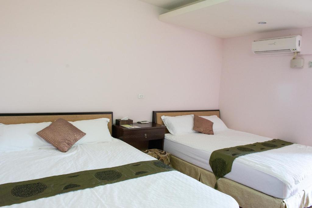 Postel nebo postele na pokoji v ubytování Come and go seaside B&B