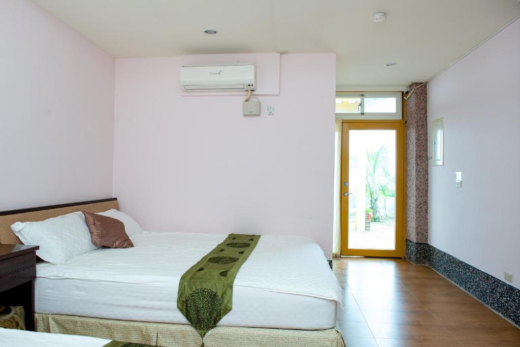 Postel nebo postele na pokoji v ubytování Come and go seaside B&B