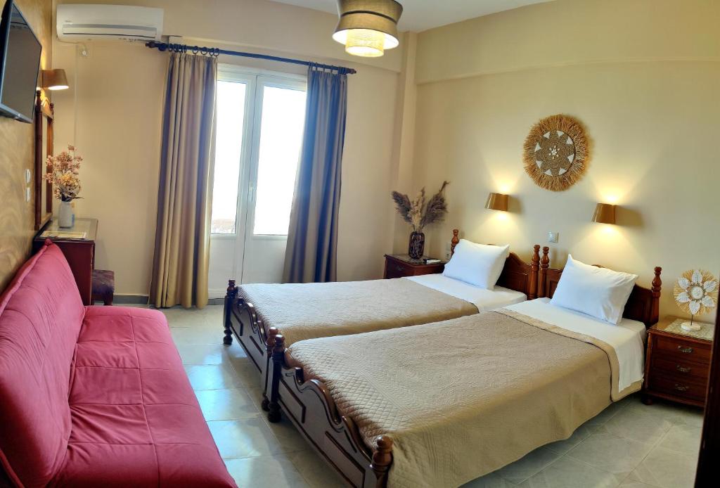 Postel nebo postele na pokoji v ubytování Borianoula Apartments