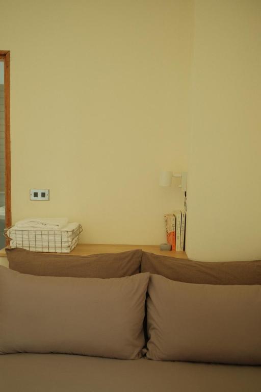 a bed in a room with a mattress at Maru in Tainan