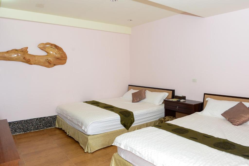 Postel nebo postele na pokoji v ubytování Come and go seaside B&B