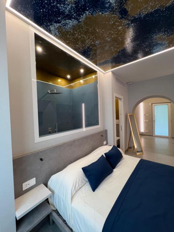 Postel nebo postele na pokoji v ubytování Shanti Rooms & Apartments Lucullo