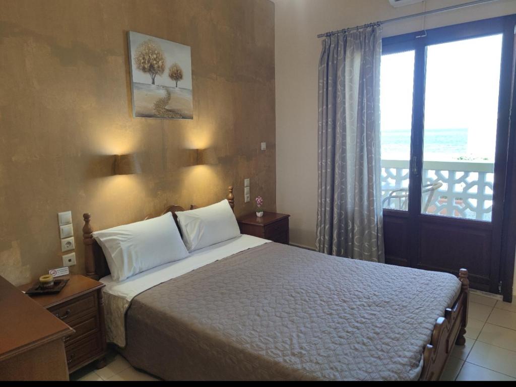 Postel nebo postele na pokoji v ubytování Borianoula Apartments