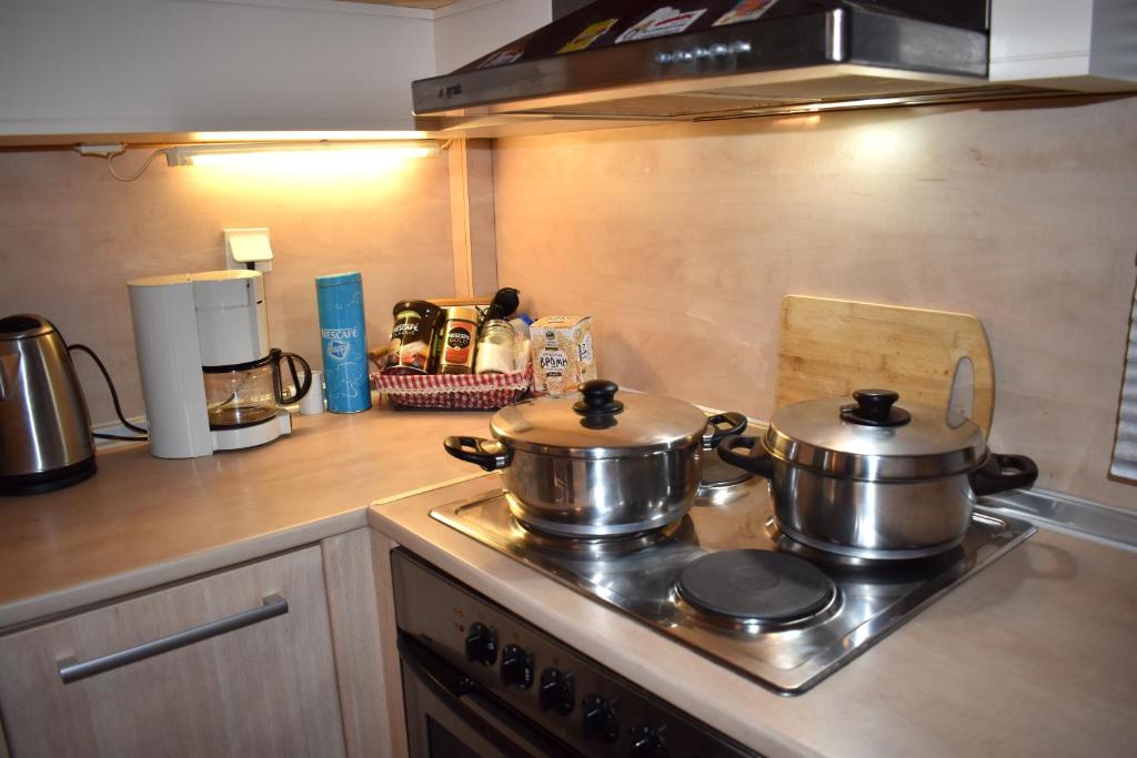 Kuchyň nebo kuchyňský kout v ubytování Kallikratia Holiday Flat 1