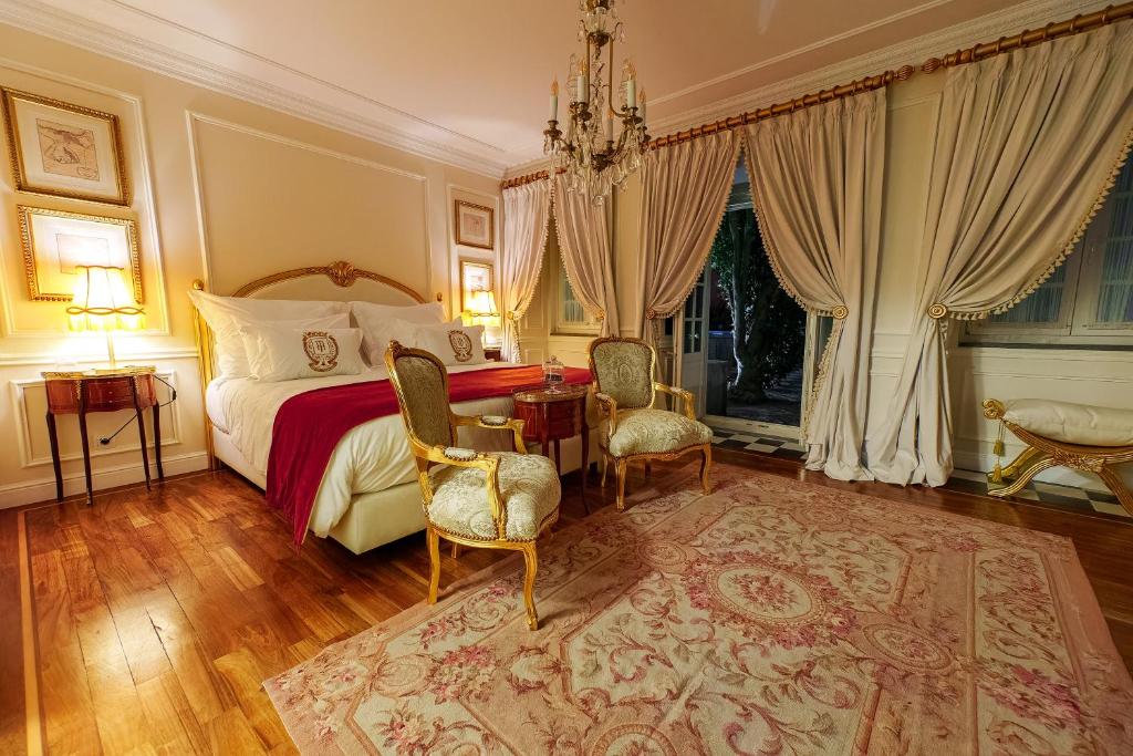 Postel nebo postele na pokoji v ubytování Boutique Hotel Teatro