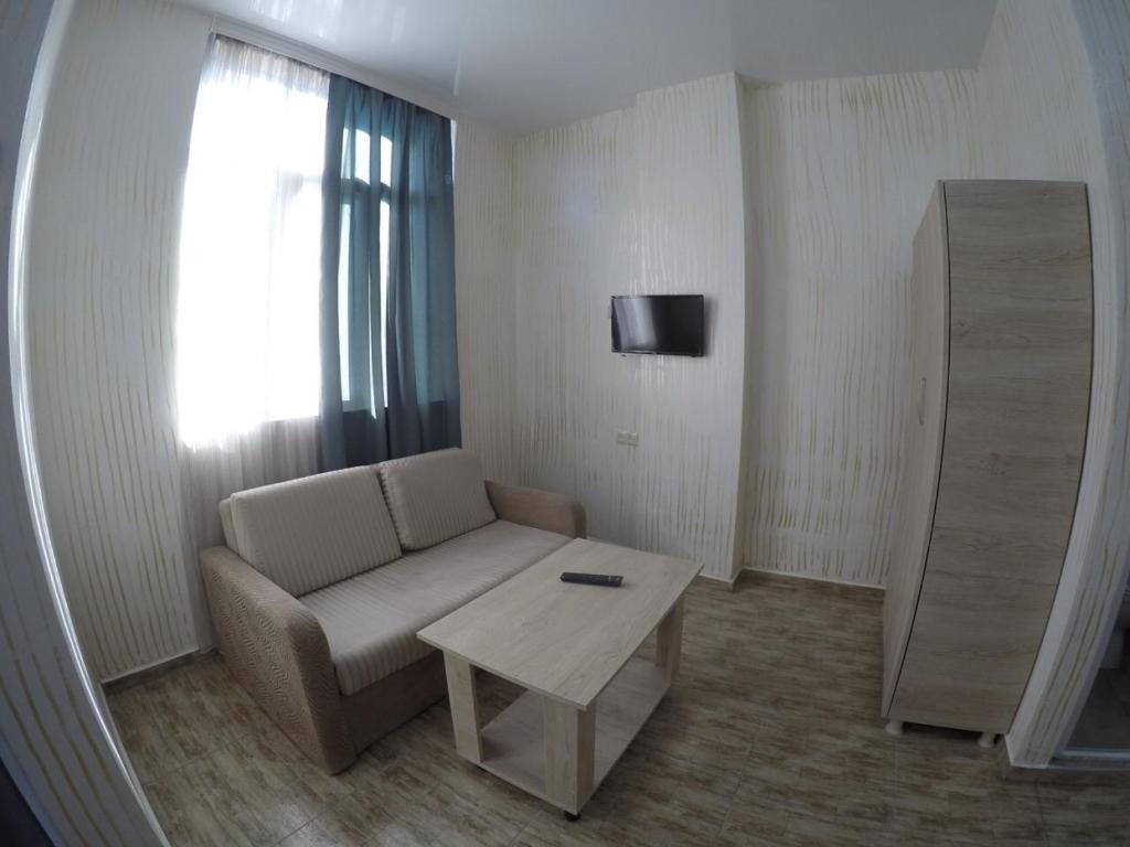 TV a/nebo společenská místnost v ubytování New Batumi Inn Hotel