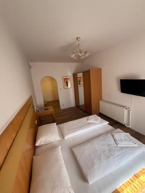 Postel nebo postele na pokoji v ubytování City Hotel Post 17
