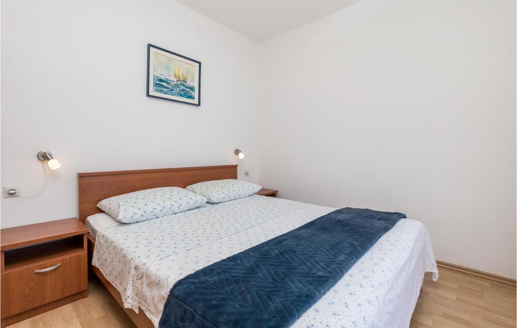 Posteľ alebo postele v izbe v ubytovaní Holiday Home Starigrad Kod Senja, Obala Cr