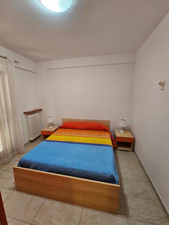 Posteľ alebo postele v izbe v ubytovaní Appartamenti Bramante