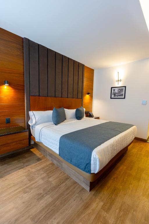 Postel nebo postele na pokoji v ubytování Hotel Noite Business Class