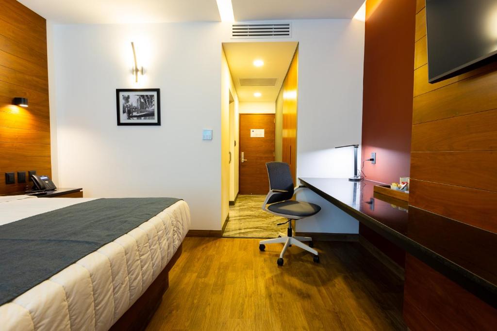 Postel nebo postele na pokoji v ubytování Hotel Noite Business Class