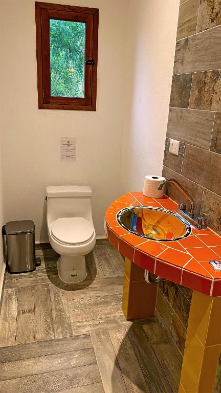 Koupelna v ubytování Gardenhotel Macan Ché B&B