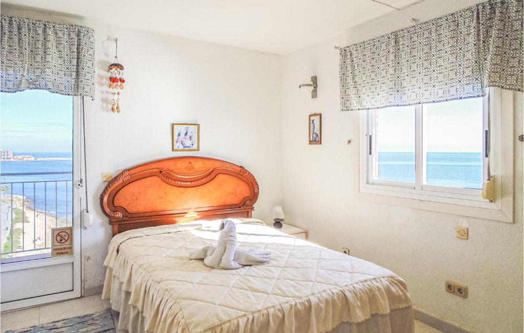 Posteľ alebo postele v izbe v ubytovaní Awesome Apartment In Torrevieja