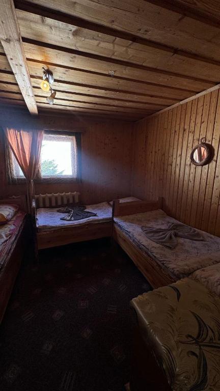 Postel nebo postele na pokoji v ubytování Ялинка
