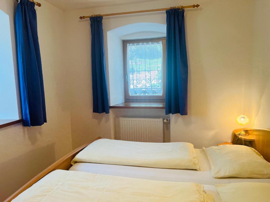 Postel nebo postele na pokoji v ubytování Apartments Bernard