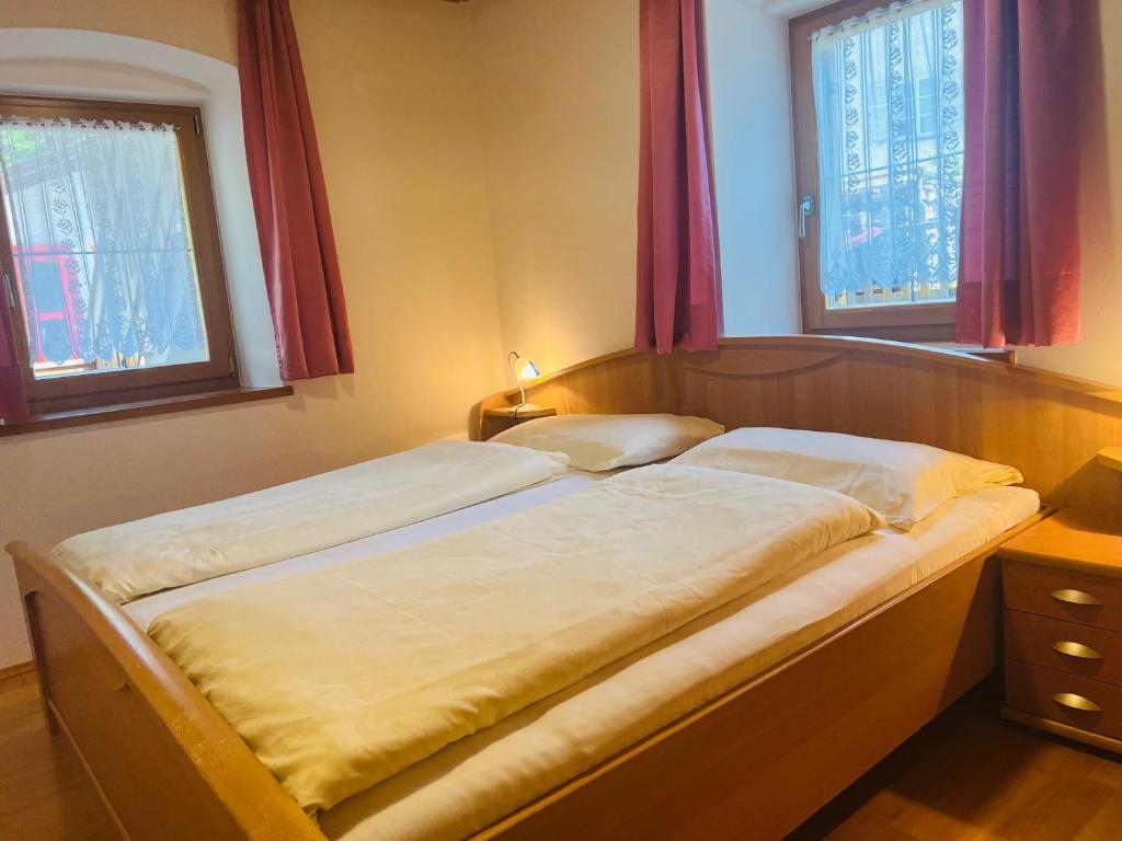Postel nebo postele na pokoji v ubytování Apartments Bernard