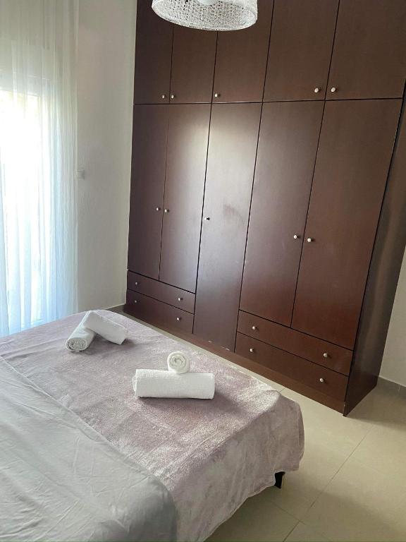 Posteľ alebo postele v izbe v ubytovaní Mimi`s Seaview Apartment