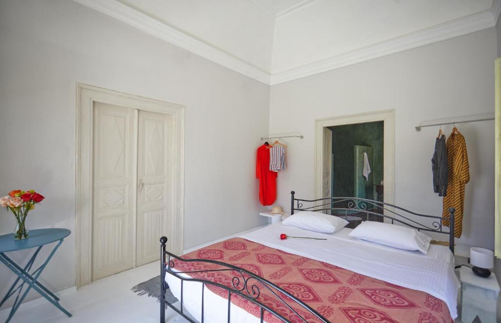 Postel nebo postele na pokoji v ubytování Constantis Mansion