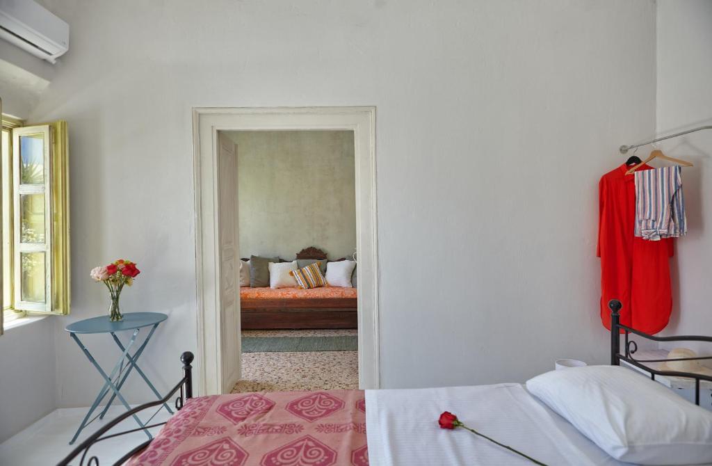 Postel nebo postele na pokoji v ubytování Constantis Mansion