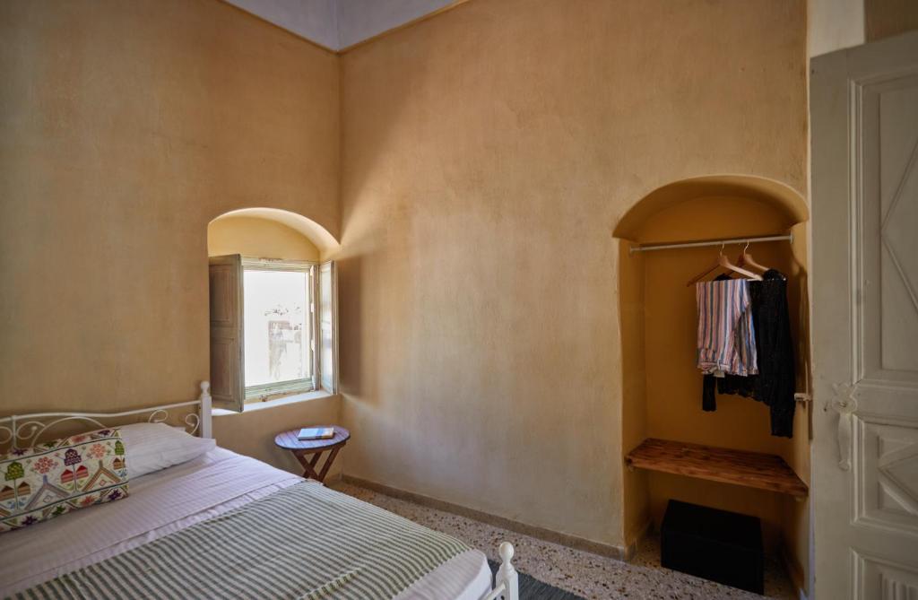 Postel nebo postele na pokoji v ubytování Constantis Mansion