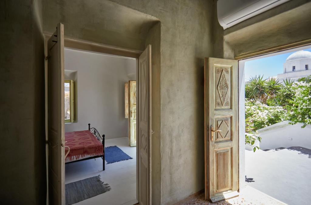 Postel nebo postele na pokoji v ubytování Constantis Mansion