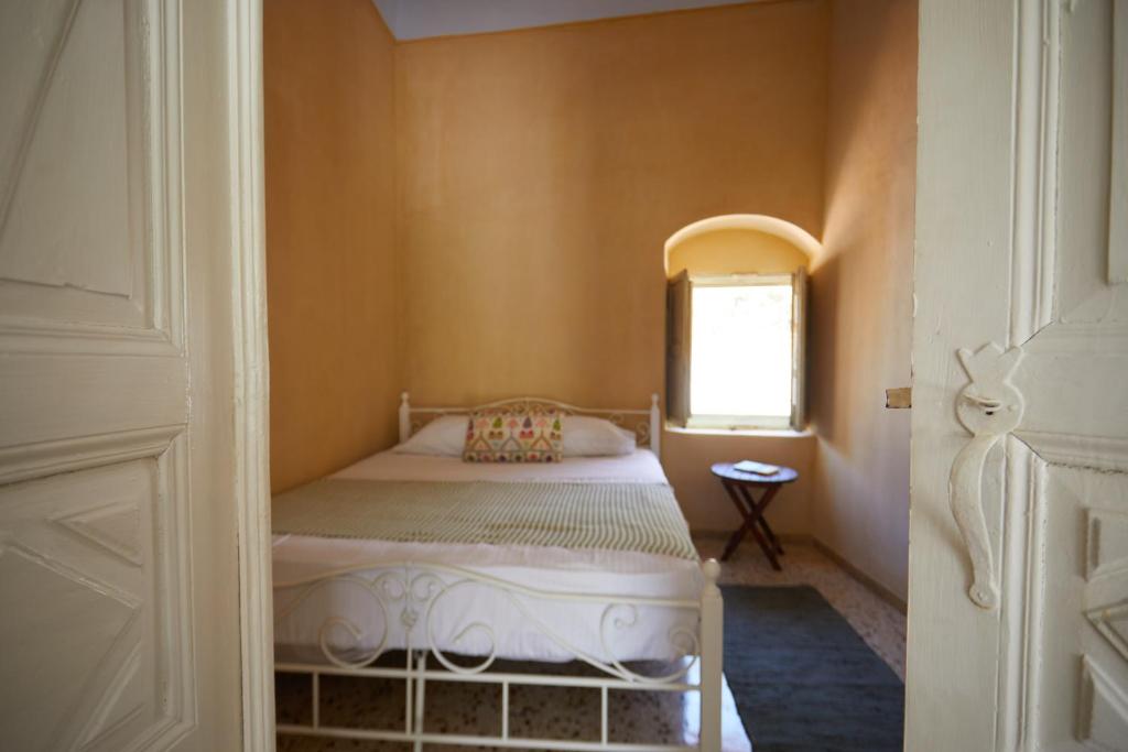 Postel nebo postele na pokoji v ubytování Constantis Mansion