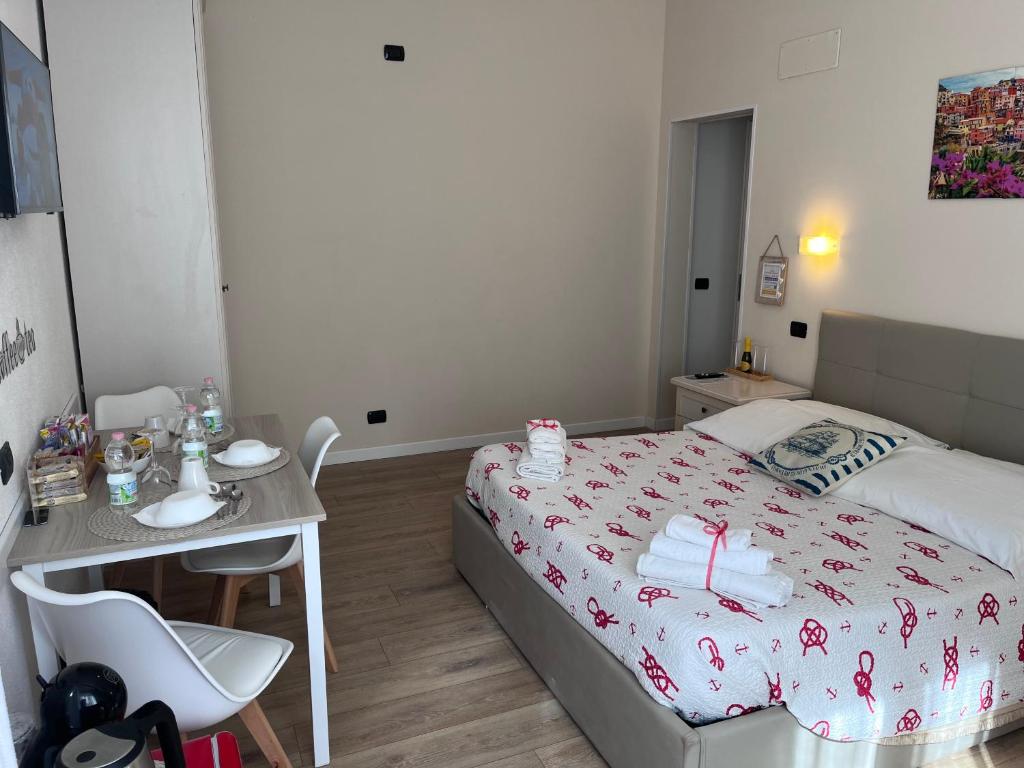 Postel nebo postele na pokoji v ubytování Affittacamere Il Veliero