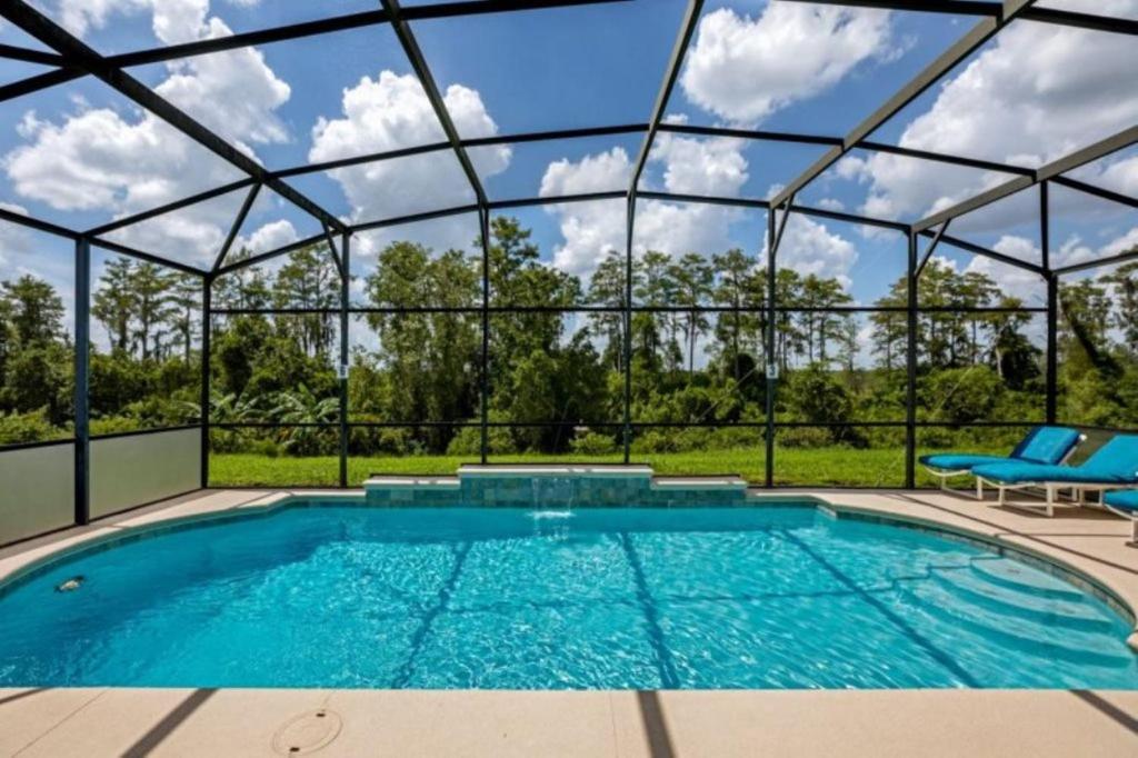 Bazén v ubytování Private Pool Homes nebo v jeho okolí