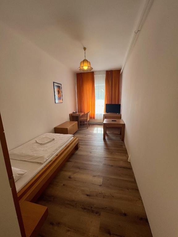 Postel nebo postele na pokoji v ubytování City Hotel Post 15