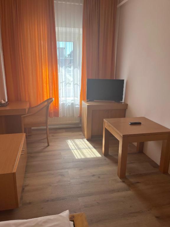 TV a/nebo společenská místnost v ubytování City Hotel Post 15